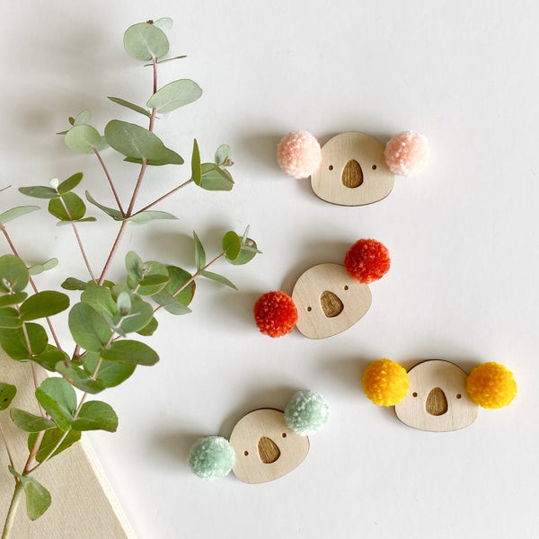 Collection of pompom koala badges