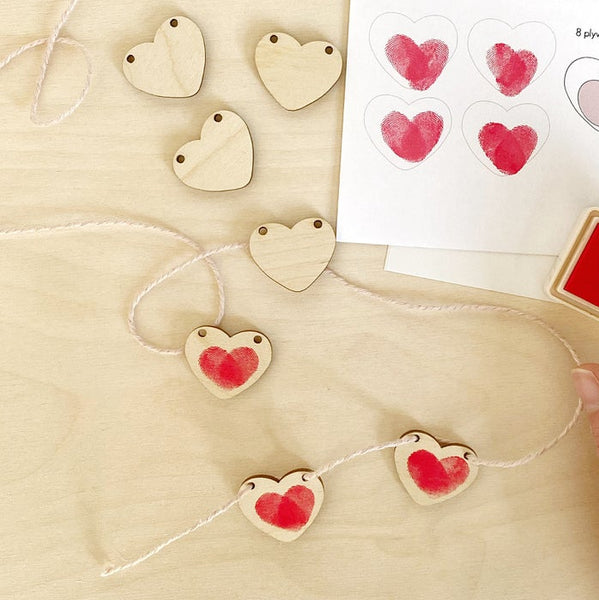 love heart garland kit being used with stamp