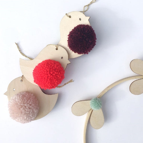 Close up of pompom robin trio