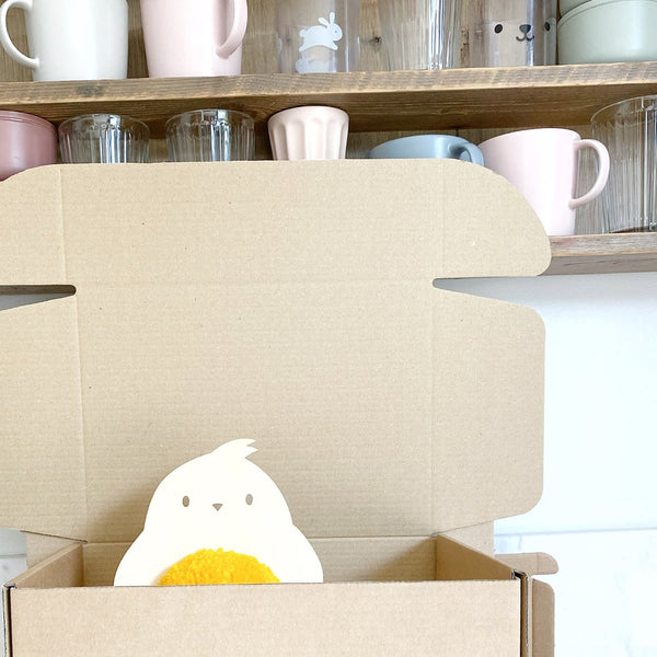 big pom pom chick in gift box