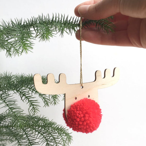 Hanging a Classic Red Frank in a Christmas tree