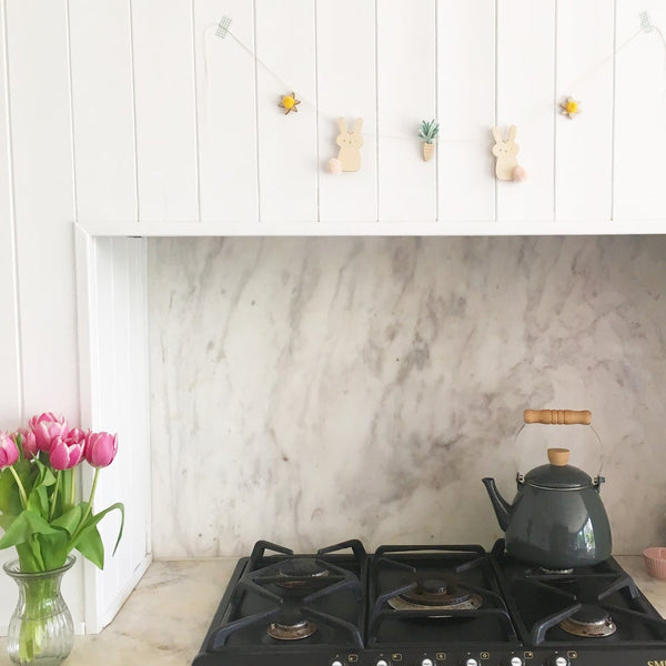 spring time garland handing in kitchen