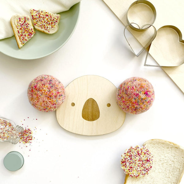 Close up of pompom koala wall plaque