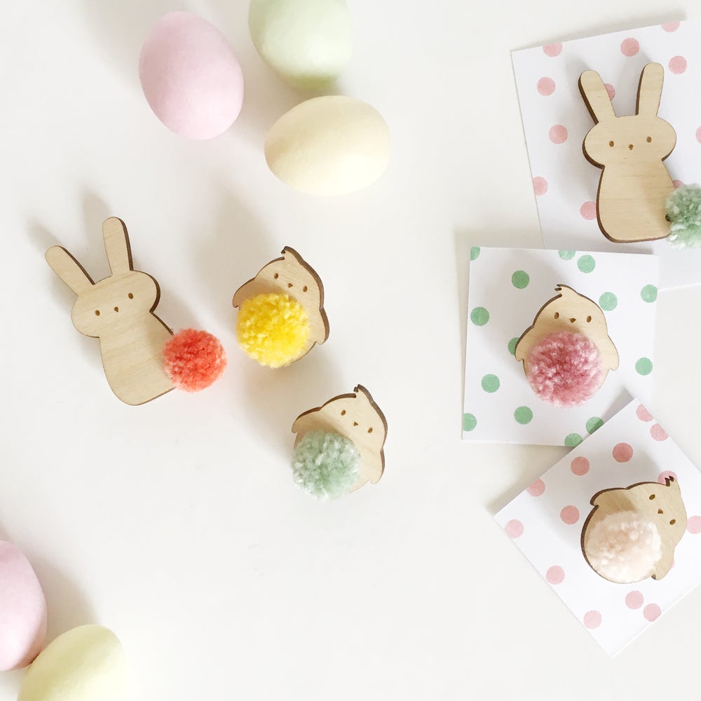Collection of spring pompom badges