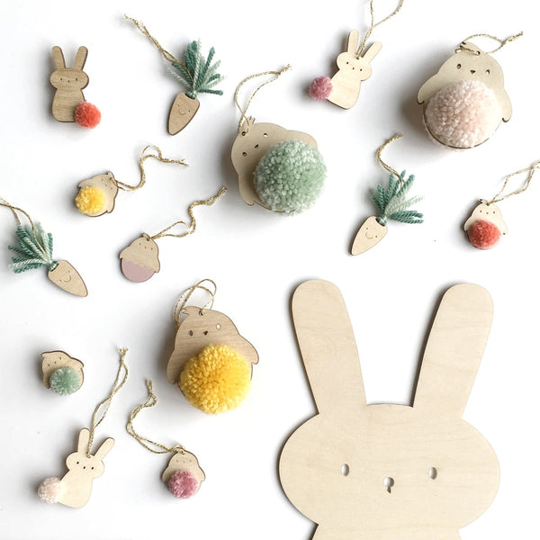 Selection of springtime easter pompom badges and decorations