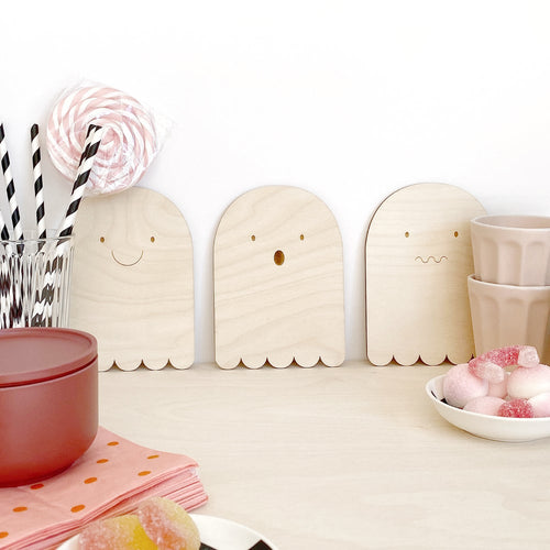 Selection of 3 ghost plywood plaques against wall