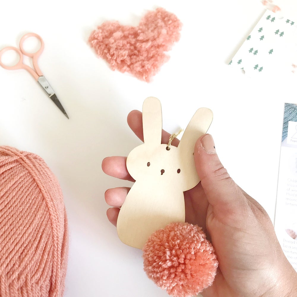 Close up of pompom bunny decoration with Pretty Peach pom pom 