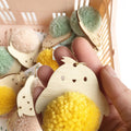 Close up of pompom chick with yellow pompom
