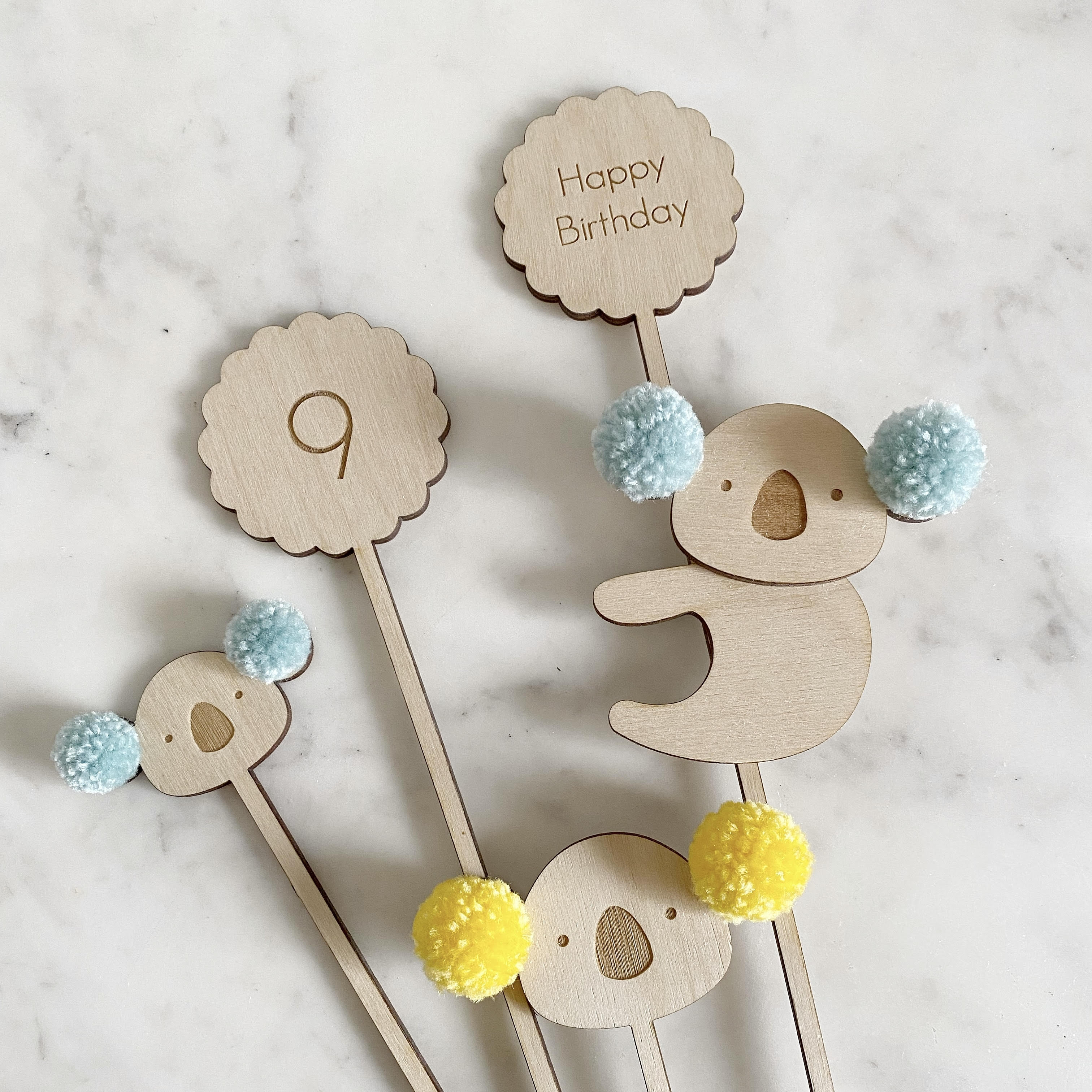 Close up of Koala cake toppers set