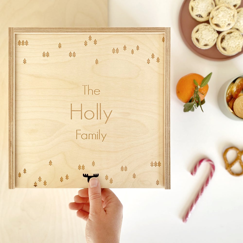 close up of personalised keepsake box with The Holly Family engraved